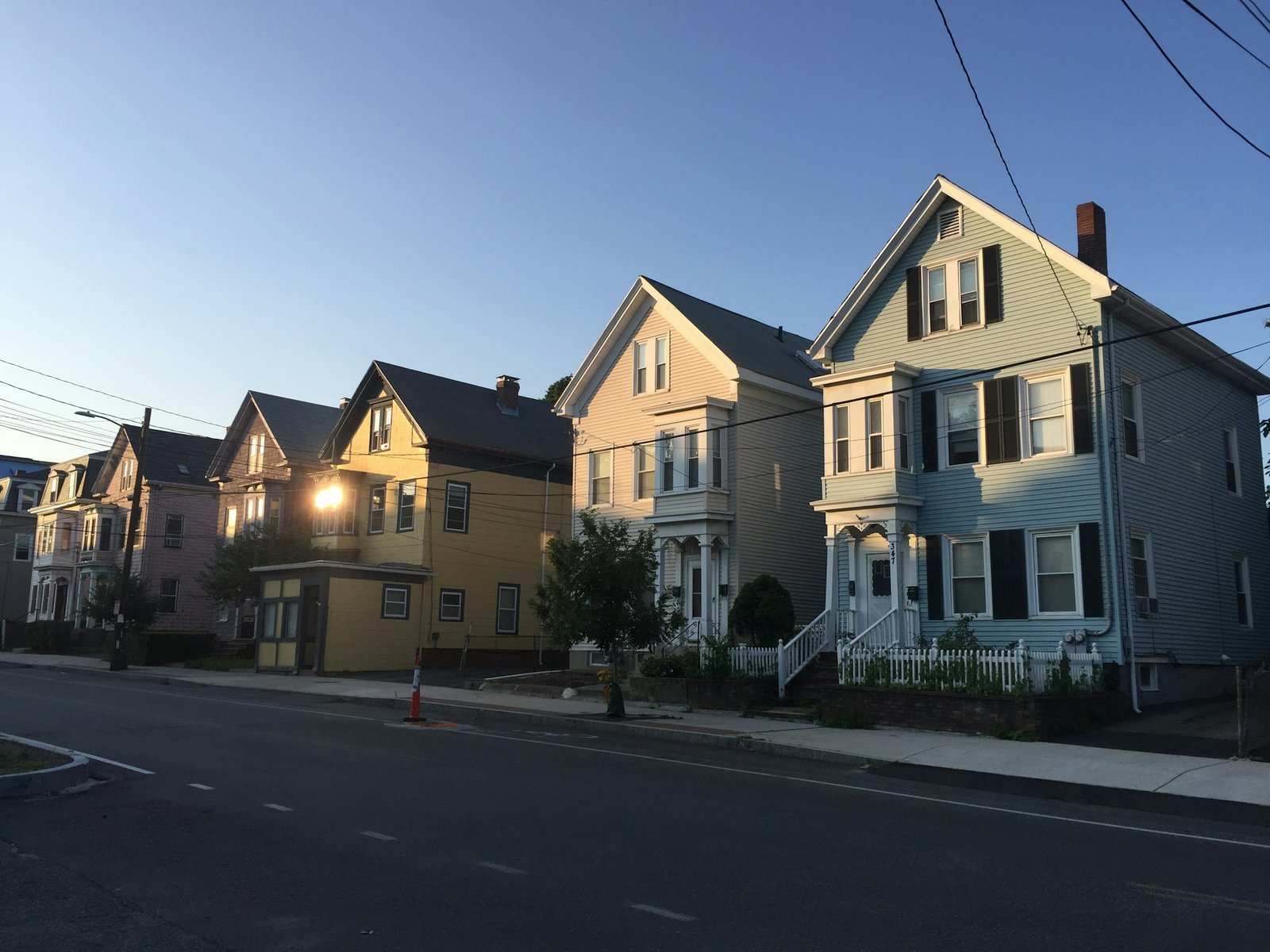 Well-kept two-family houses on a North Jersey street
